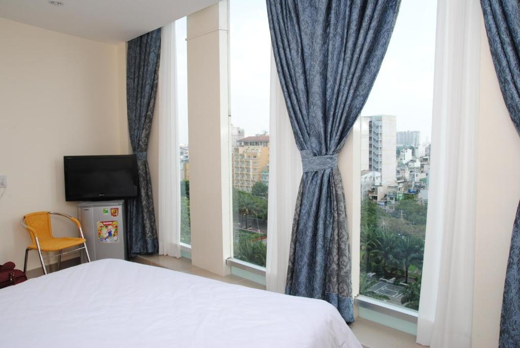 Vietnam Backpacker Hostels - Saigon Хошимин Номер фото